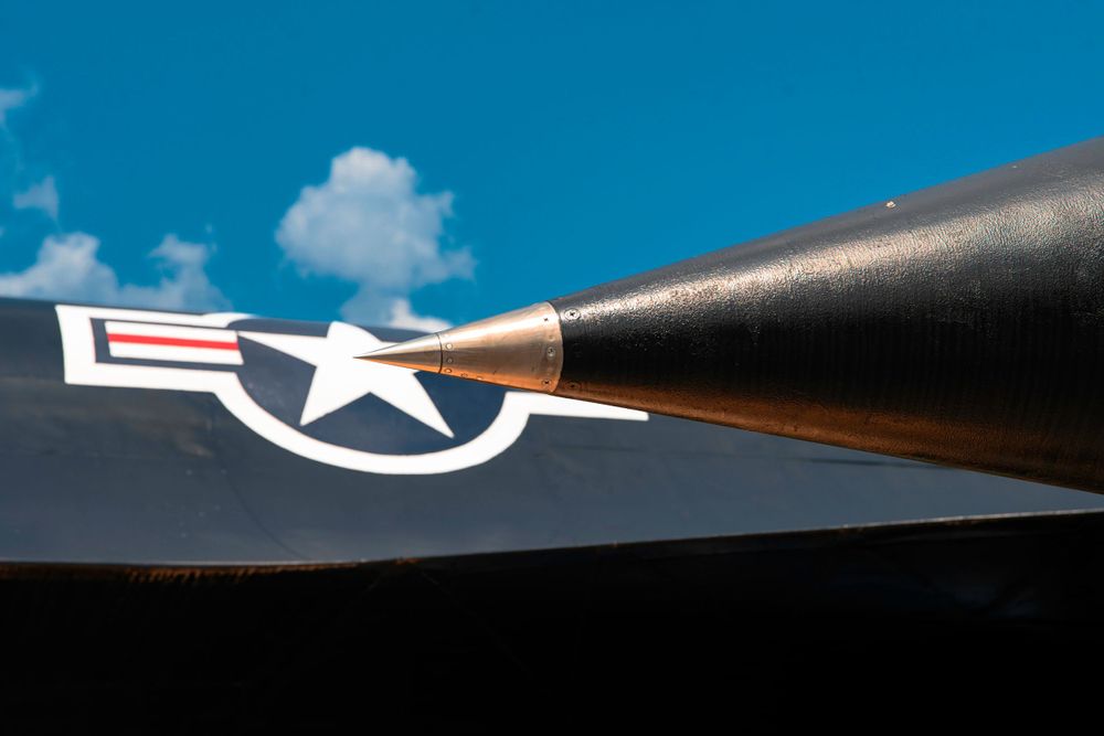 Close-up detail of US Air Force insignia on the wing of a military aircraft.