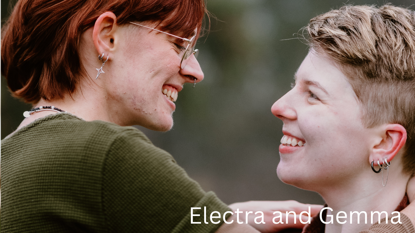Close up profile of two people sharing a joyful moment together outdoors.