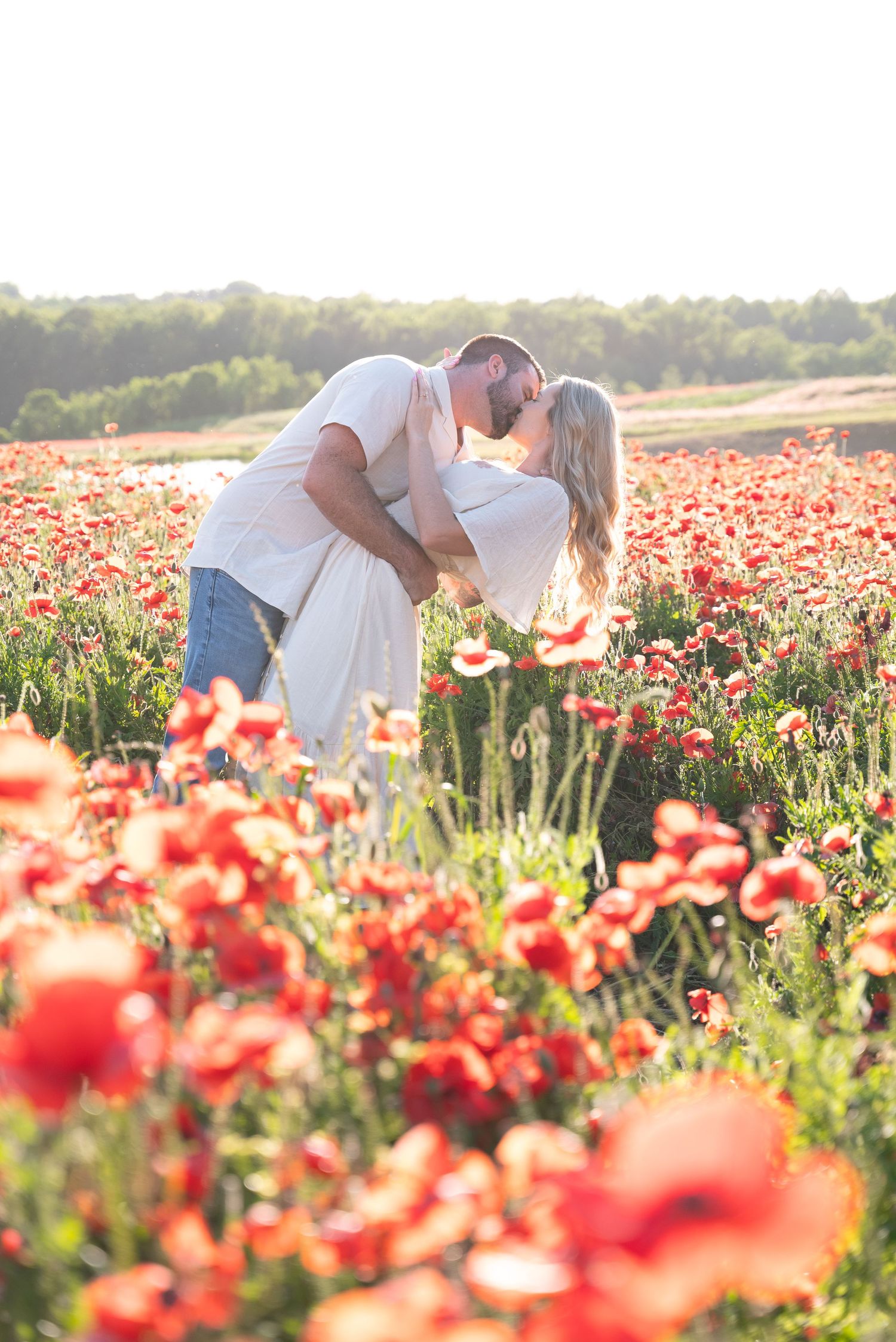 Engagement in poppies photo