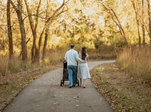 A panoramic series of autumn forest path images showing people walking away from the camera in golden sunlight.