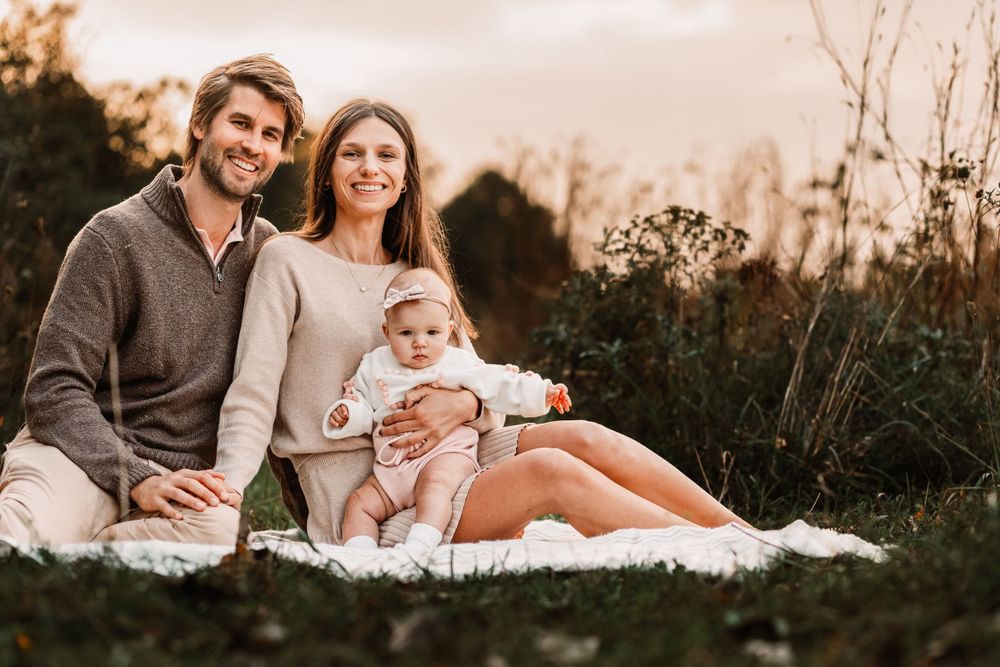 Fall family photo session with a newborn taken in Burton, Michigan