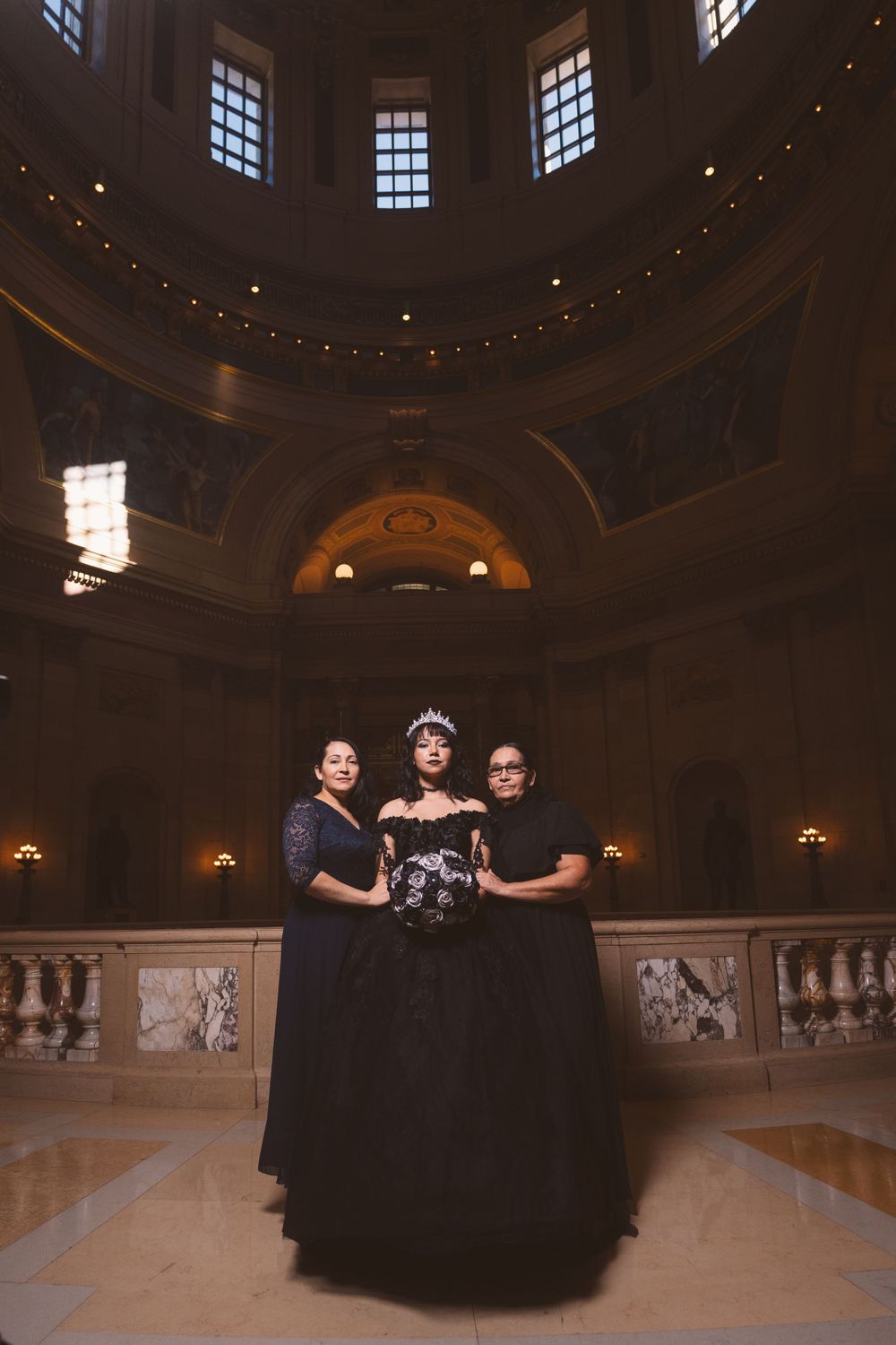 An elegant scene in a historic building with ornate architecture and dramatic lighting.