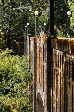 Family posing on the bridge at Seattle Arboretum.