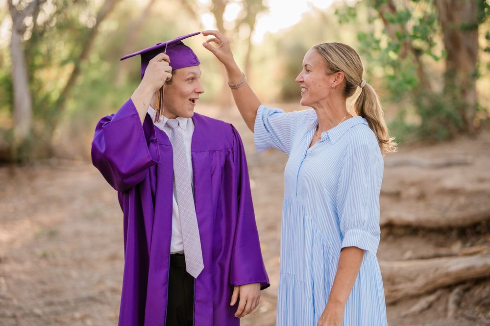 Gilbert Arizona photographer Melissa Maxwell of Jubilee Family Photography. Graduating senior in cap and gown & mother in Queen Creek Wash