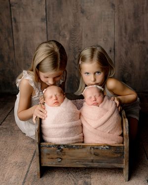 Twin with big siblings photography in Marion Indiana
