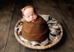 Baby girl in Newborn photoshoot in Marion Indiana