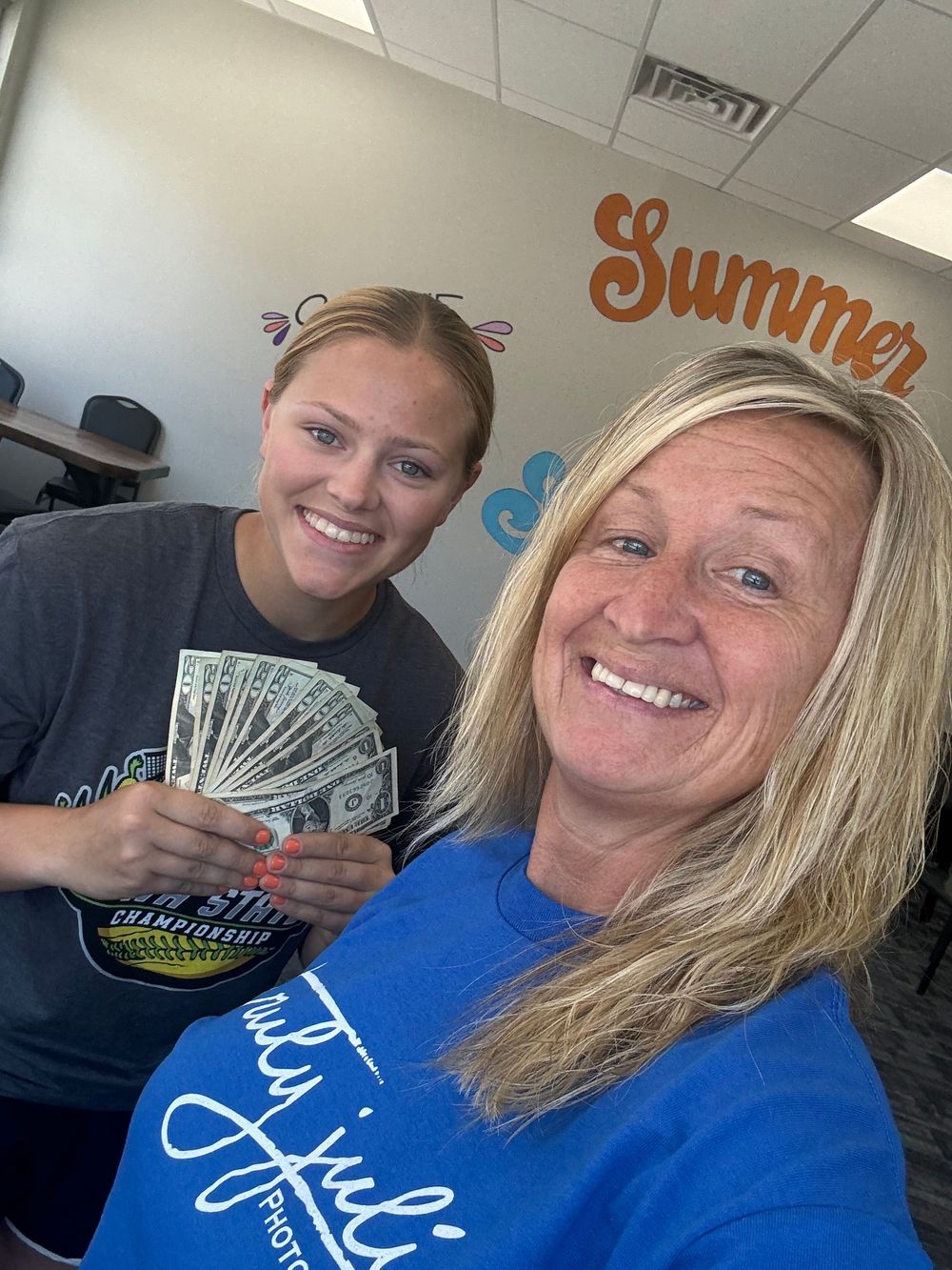 Truly Juli and her Senior Star posing for a selfie after her Senior Model just won cash for giving her referrals.