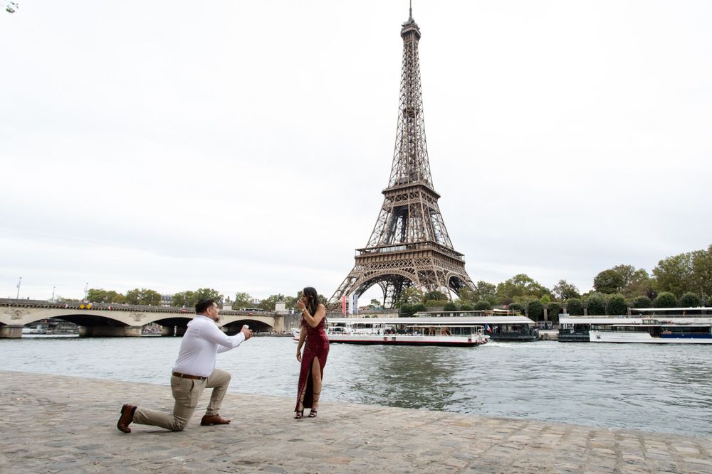 Secret surprise proposal at the Eiffel Tower captured by Paris photographer Julien LB.