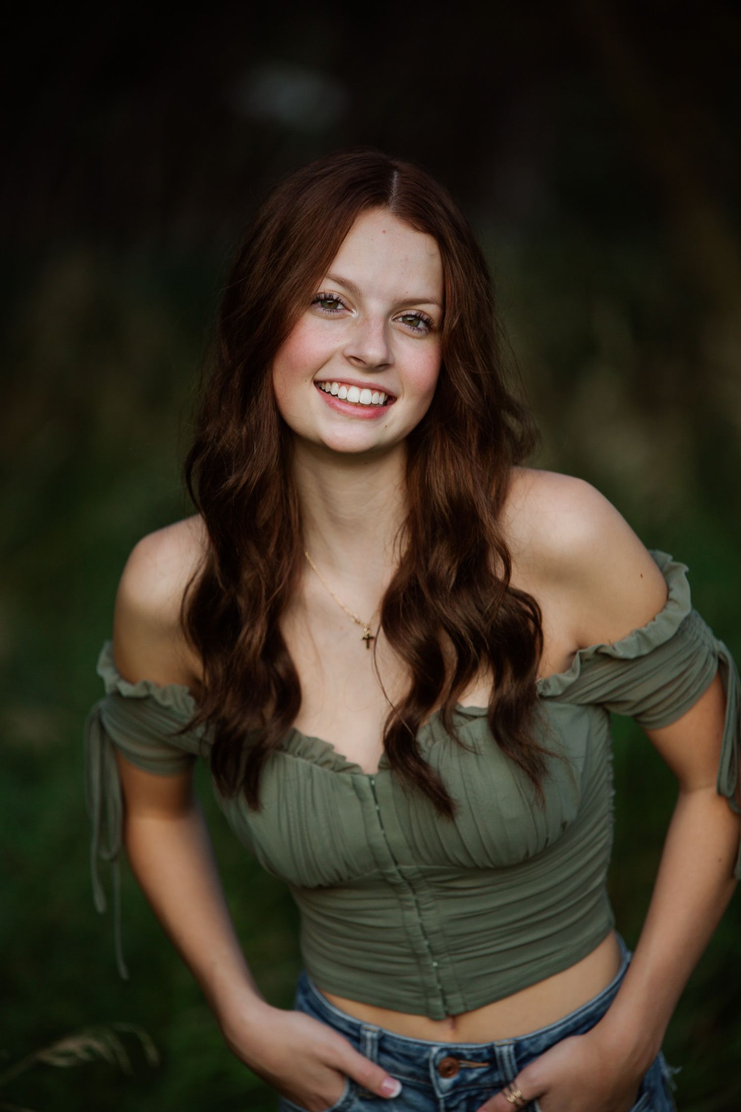 Omaha Maternity Photography of stunning woman in Mama Bump maternity dress.