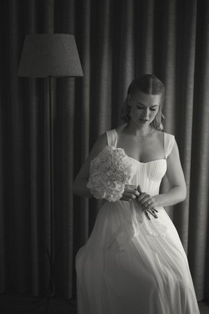 Elegant bridal portrait of a bride in a timeless wedding gown with soft natural light.