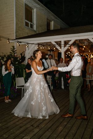 A couple shares their first dance on the patio at the Northridge Inn- Alexis Anne Photography