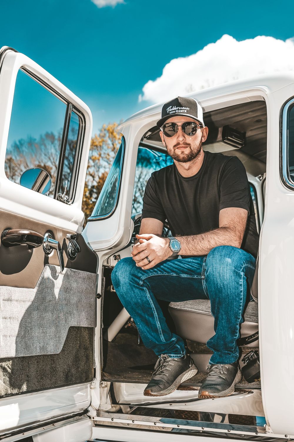 Interior shots of restored vintage white truck showing custom details.