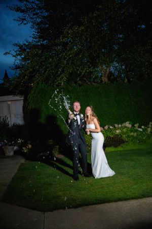 Champagne sprays after the reception ends.