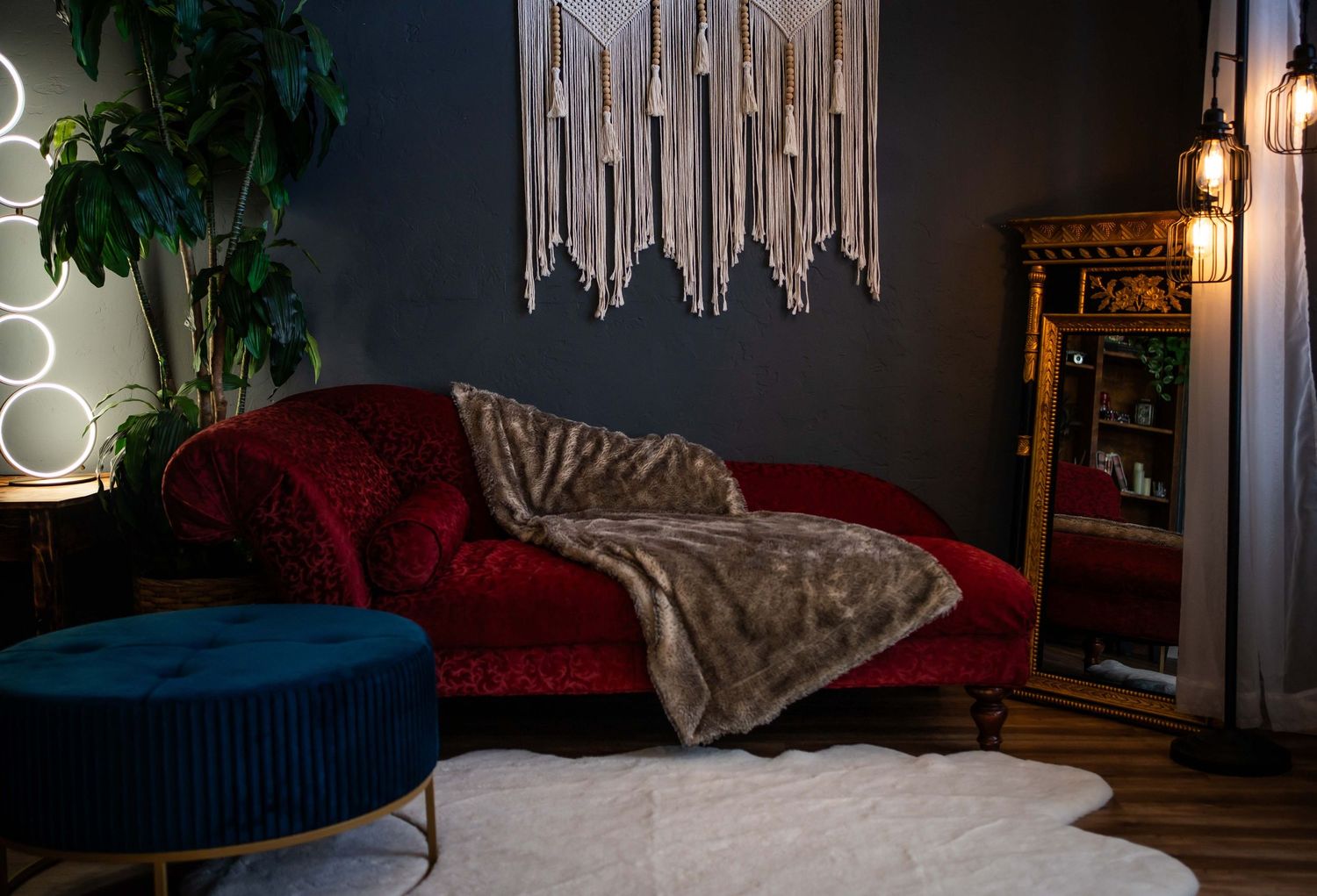 photo set up with a purple couch and blue ottoman