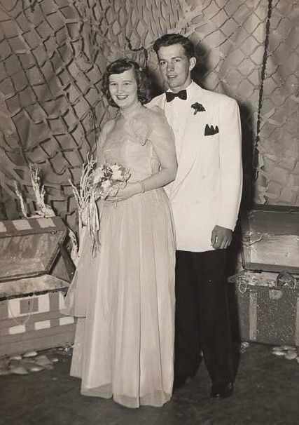 Antique prom portrait of a young couple.