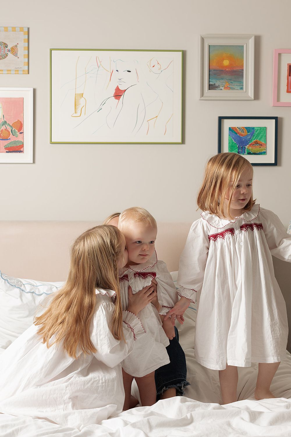 London, UK, motherhood photography session. Sisters wearing matching Smock London night dresses.