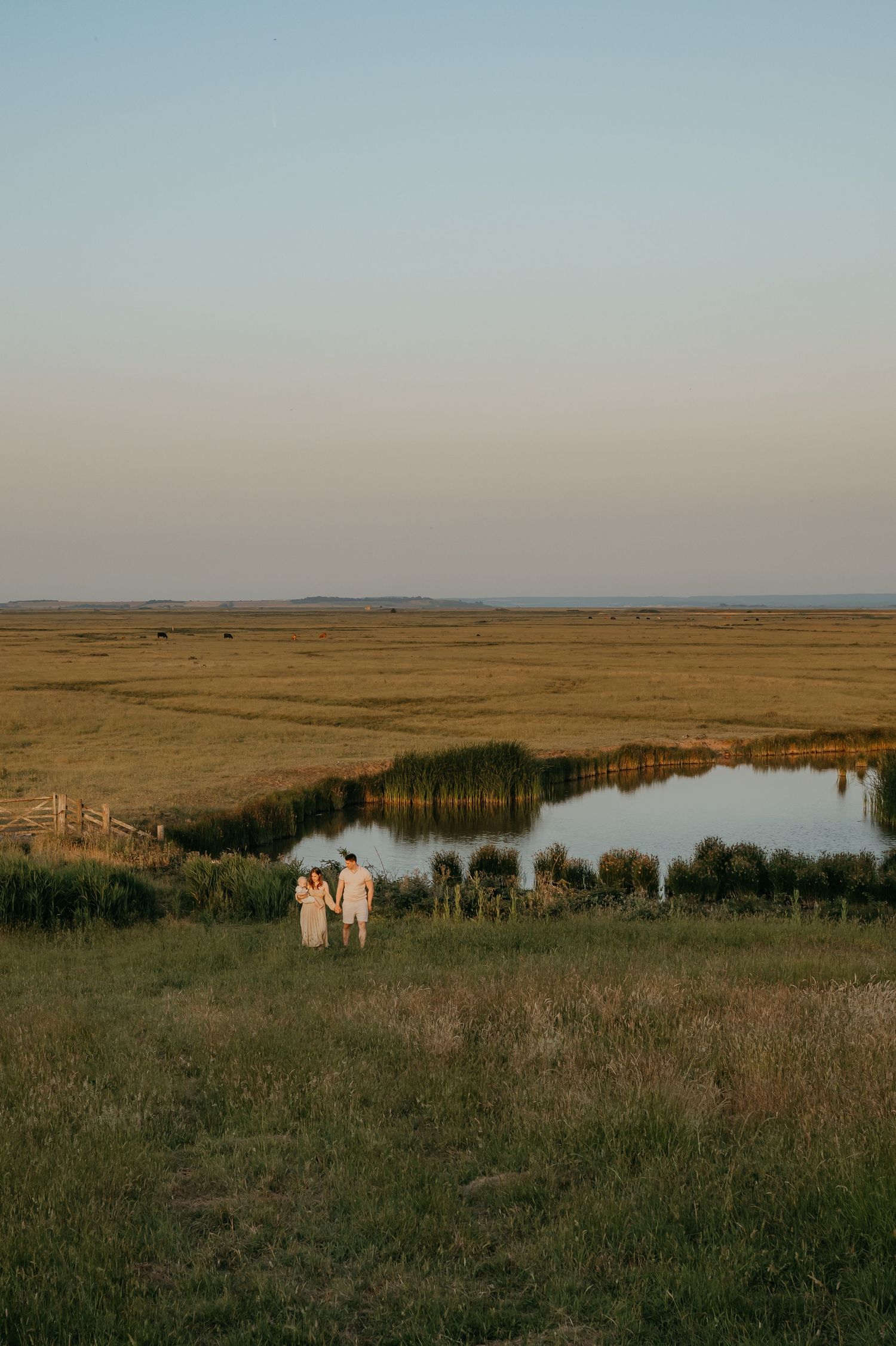 family at sunset in Elmley Reserve, kent
