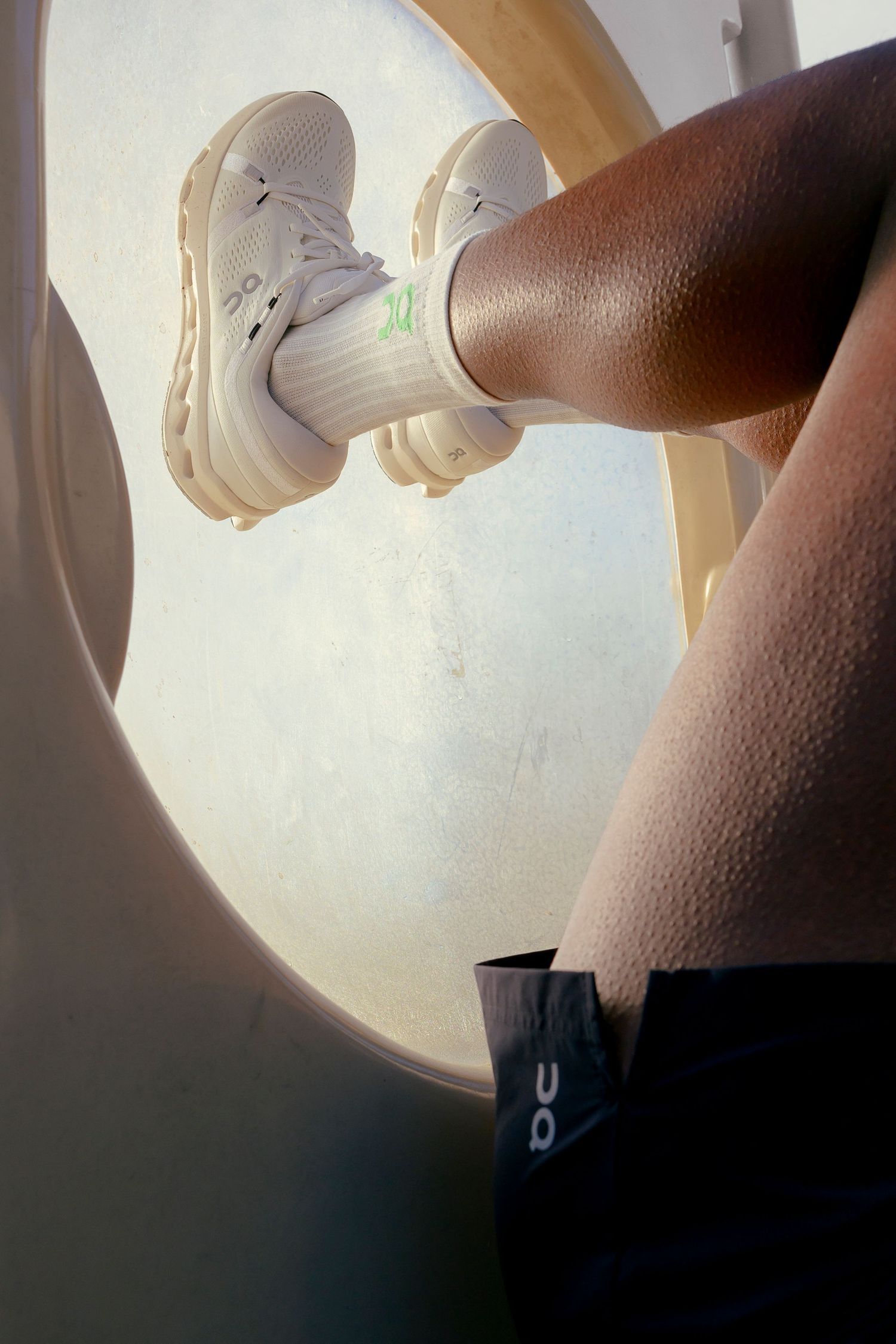 Runner on a playground in commercial running shoot.