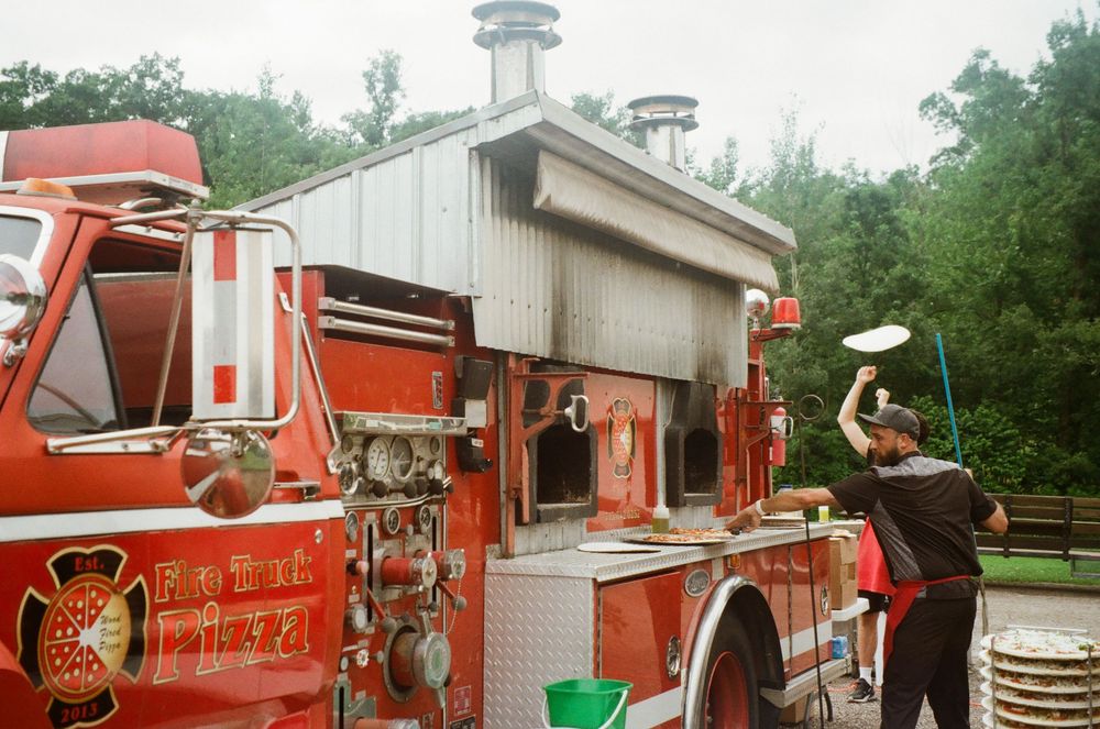 A collage of red fire trucks and emergency vehicles at various angles showing their equipment and features.