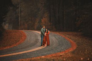 Several photos of people walking along a curved road surrounded by autumn trees.