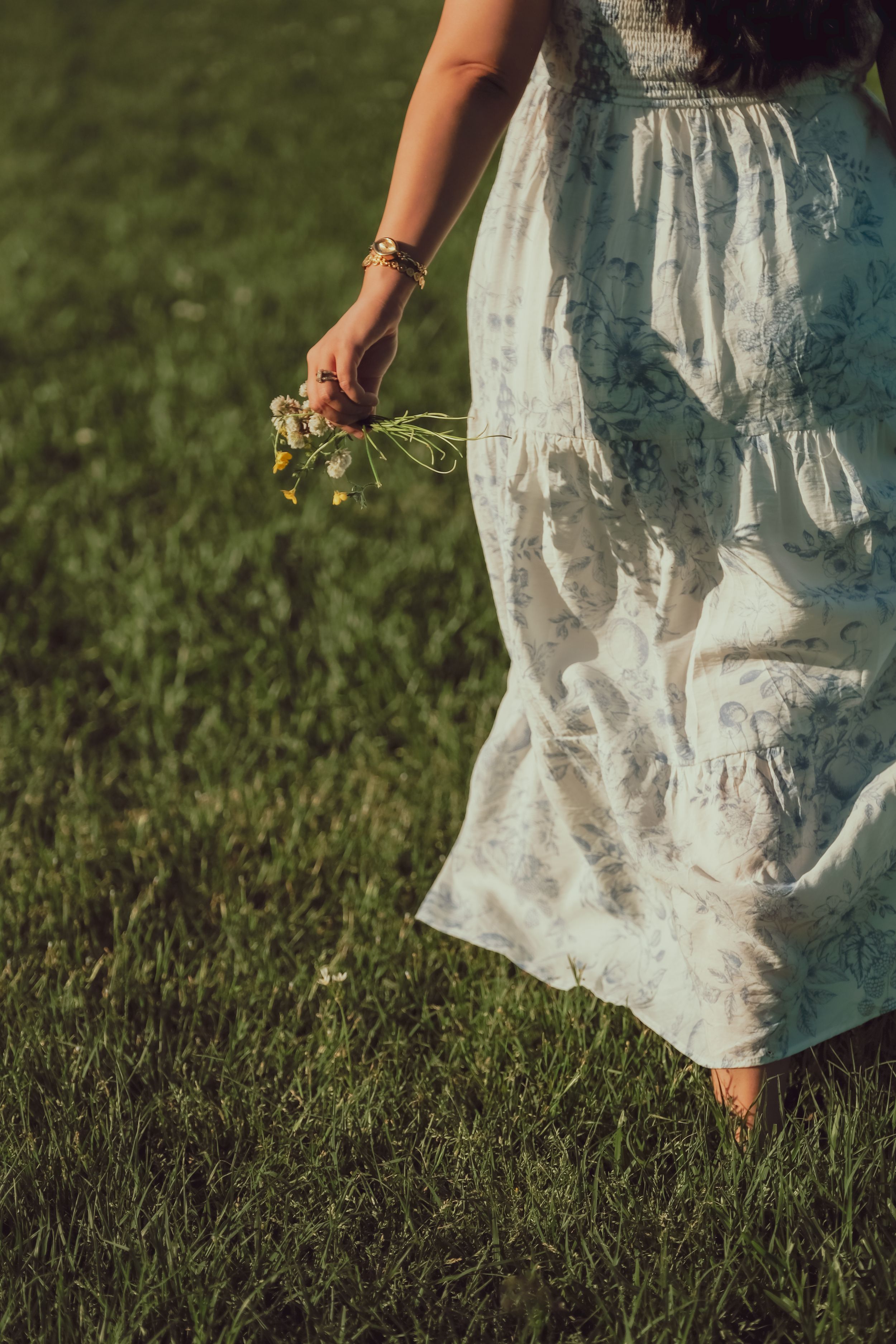 girl walking in grass long dress senior photo Lafayette