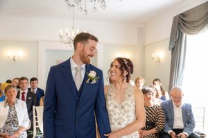 A series of wedding celebration moments captured in a horizontal photo collage showing dancing and joyful interactions.
