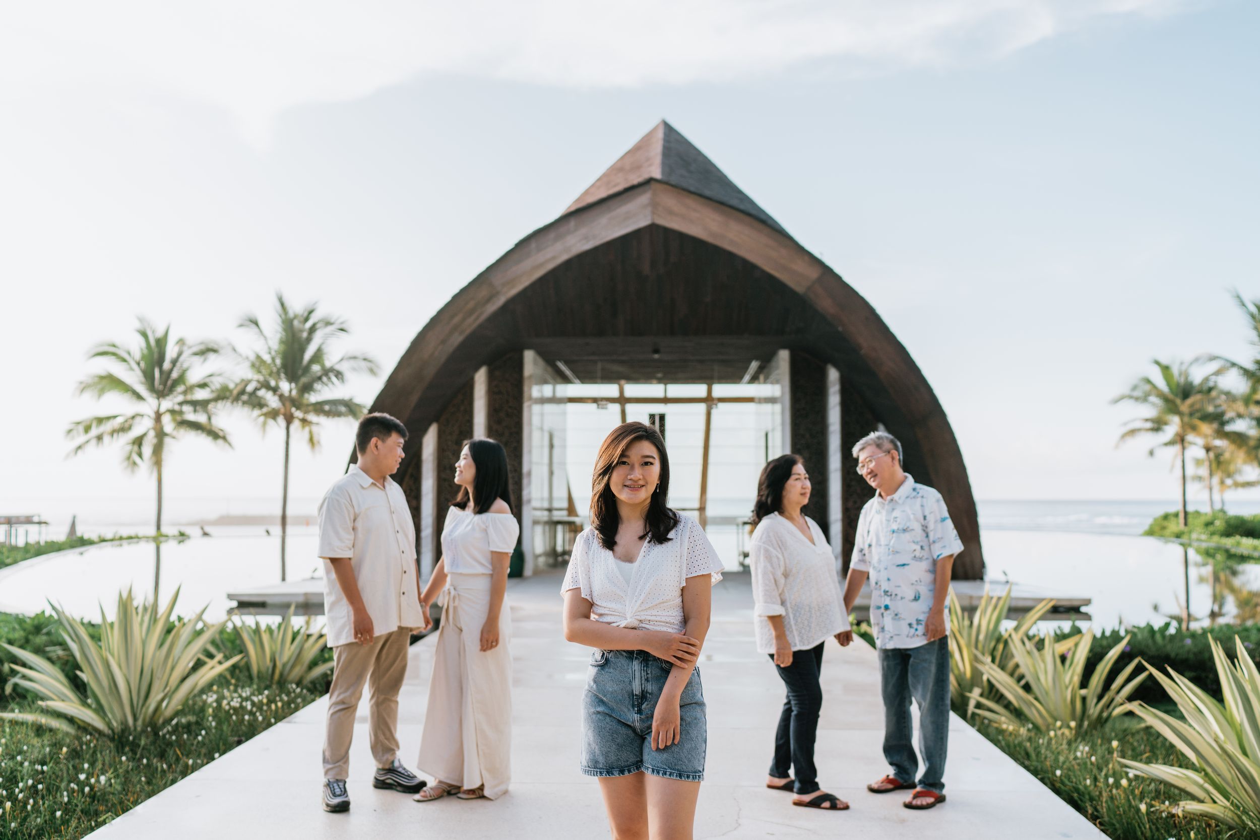 Professional family photoshoot at The Apurva Kempinski Bali’s beachfront area.