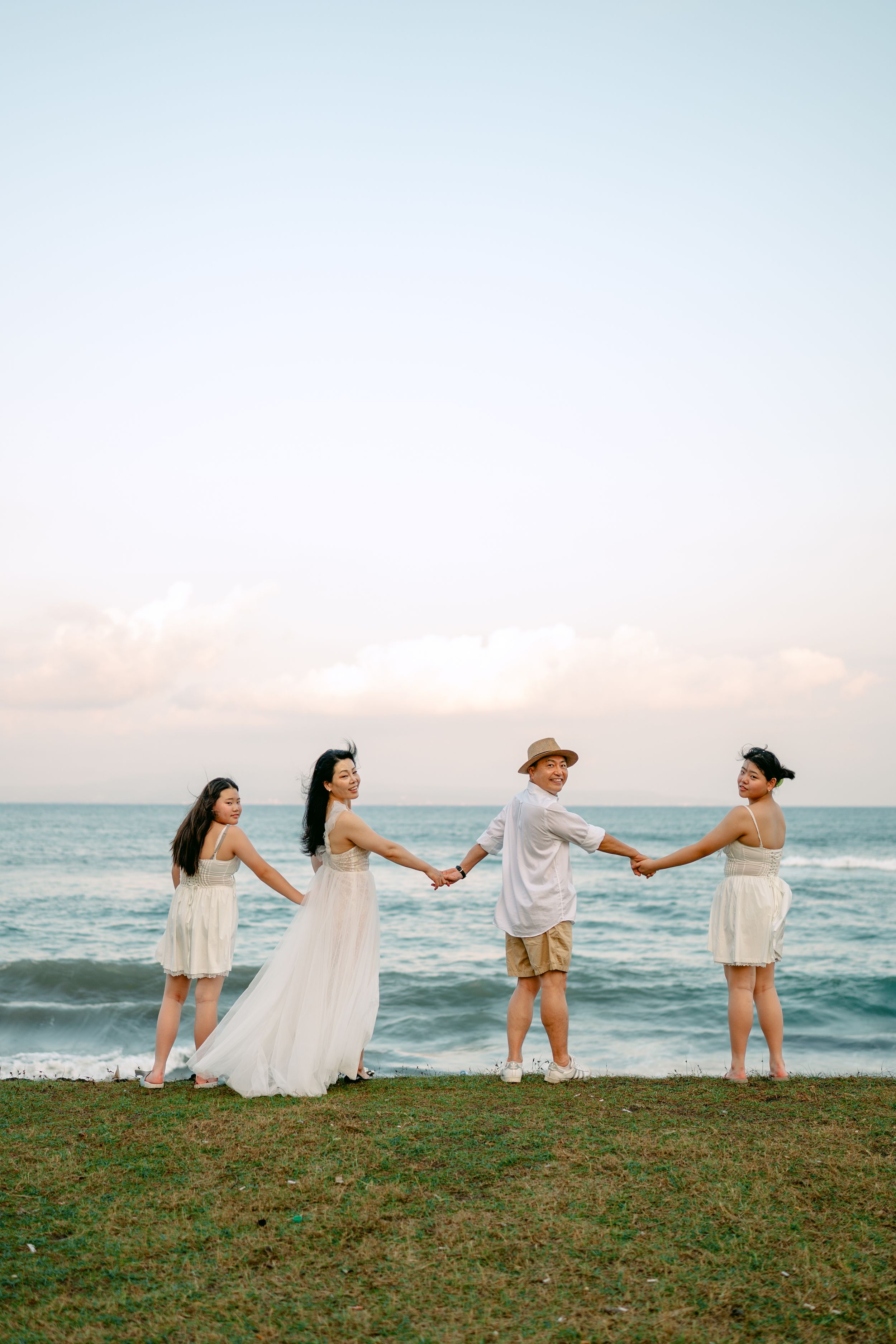 Bali family photography services with beach background