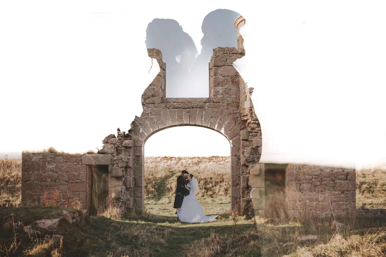 A couple embraces under a romantic stone archway at sunset, in a double exposure against a rustic landscape.