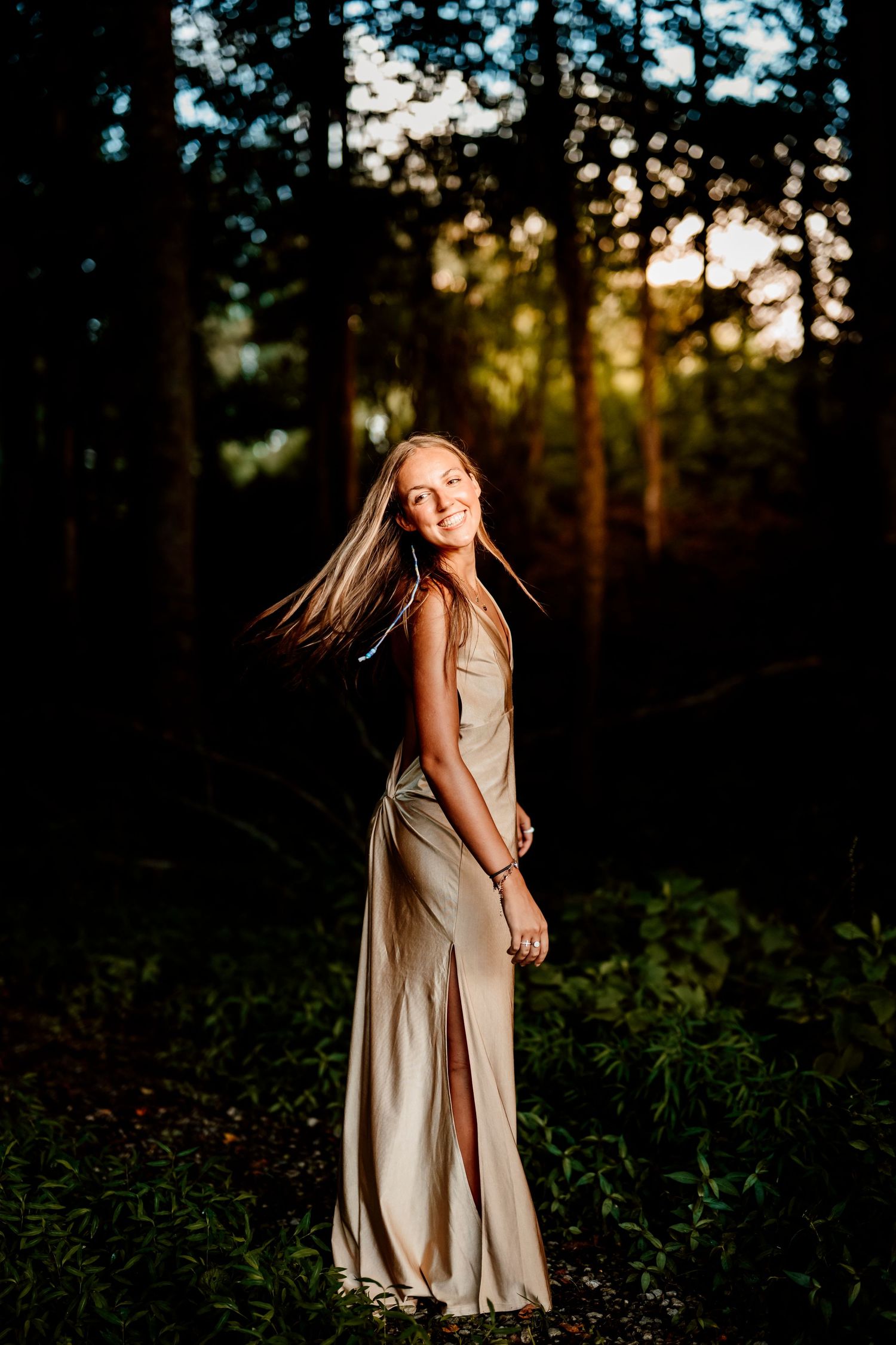 Girl standing in the woods