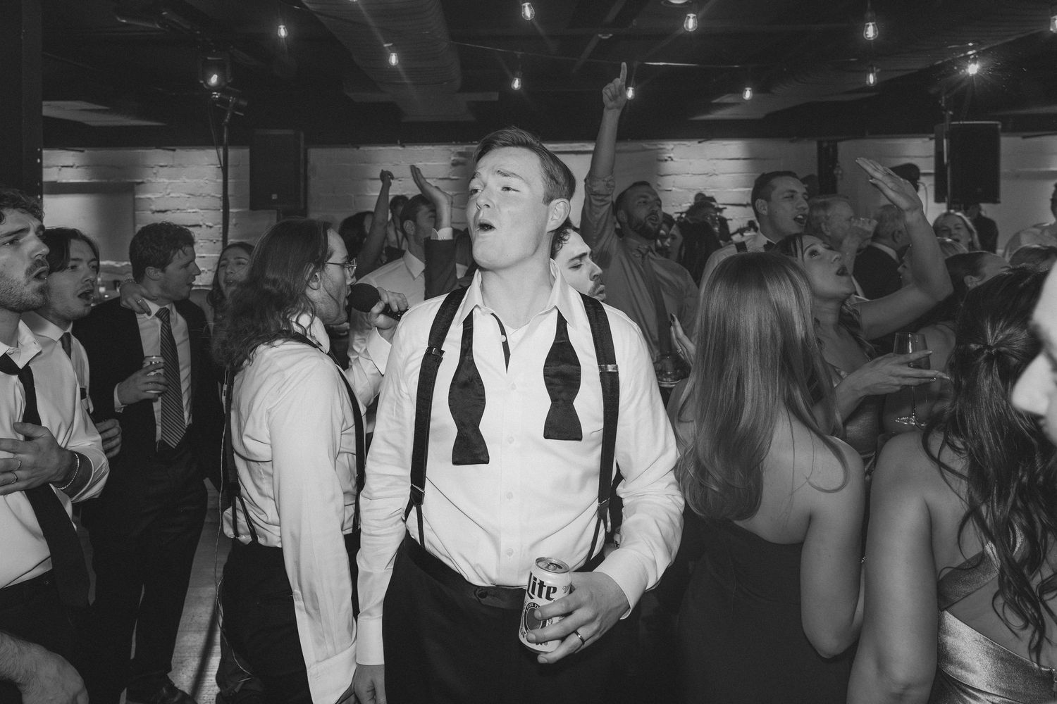 Father hugging daughter during bridal first dance