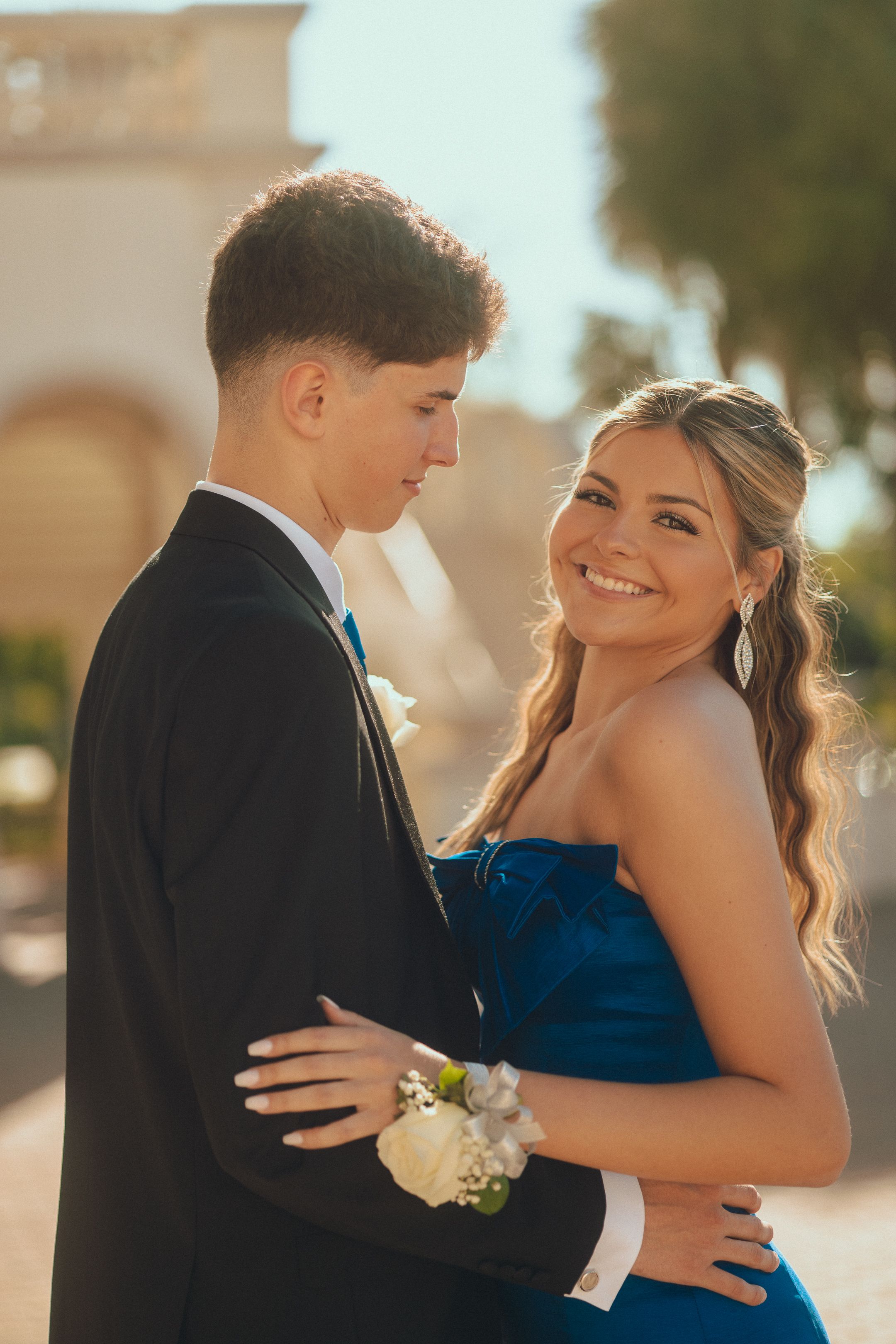 Elegant couple in evening attire, West Palm prom photography by Mannyportraits, timeless editorial portrait for South Florida events.