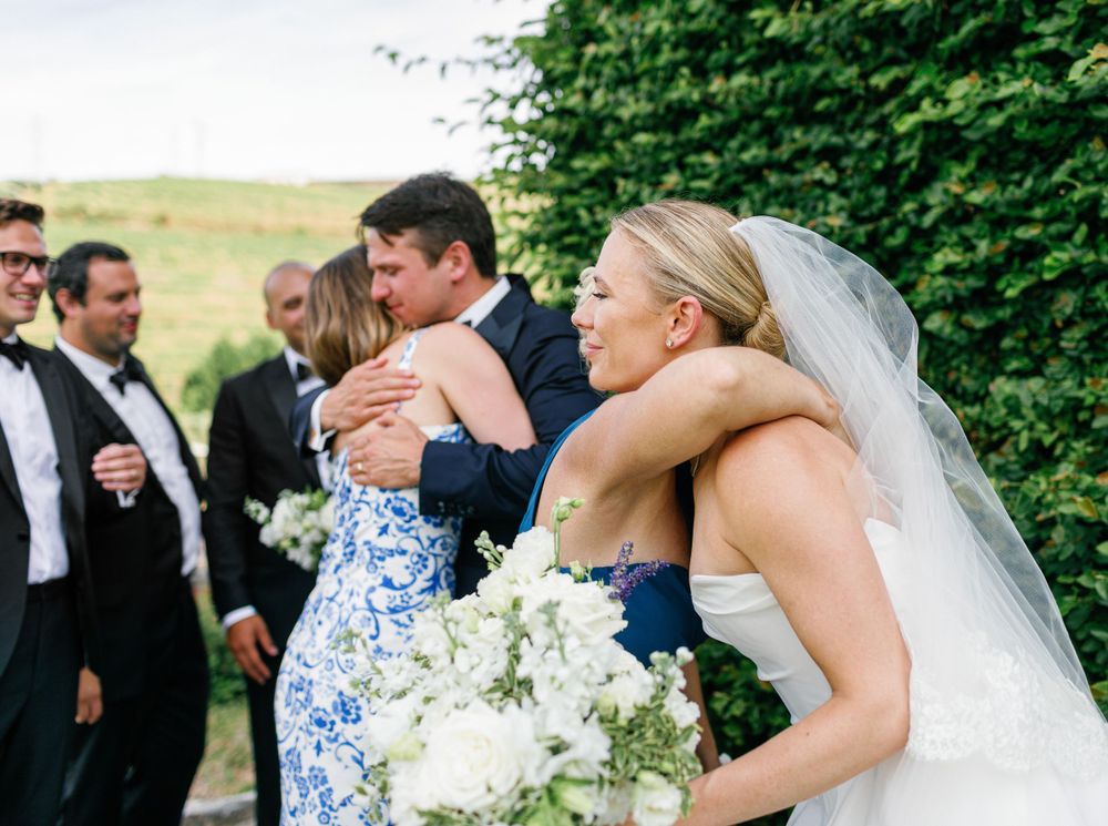 Newlyweds celebrate with friends after the ceremony at Six Senses Douro Valley.