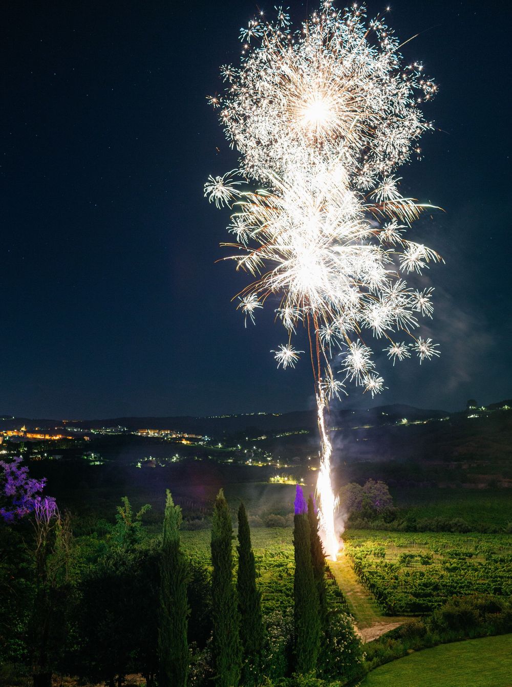 Bright fireworks display celebrating the couple's special day at Six Senses Douro Valley.