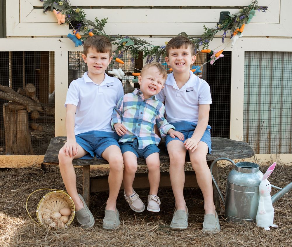 children posed with a bunny for a easter themed photo session
