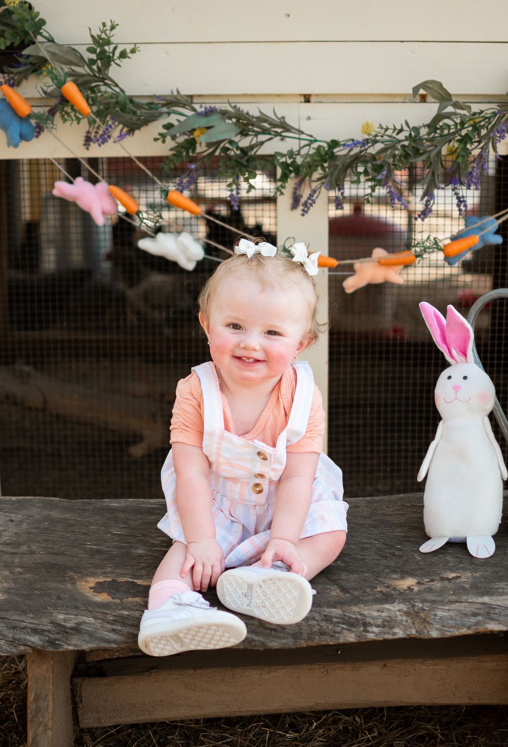child posed with a bunny for a easter themed photo session