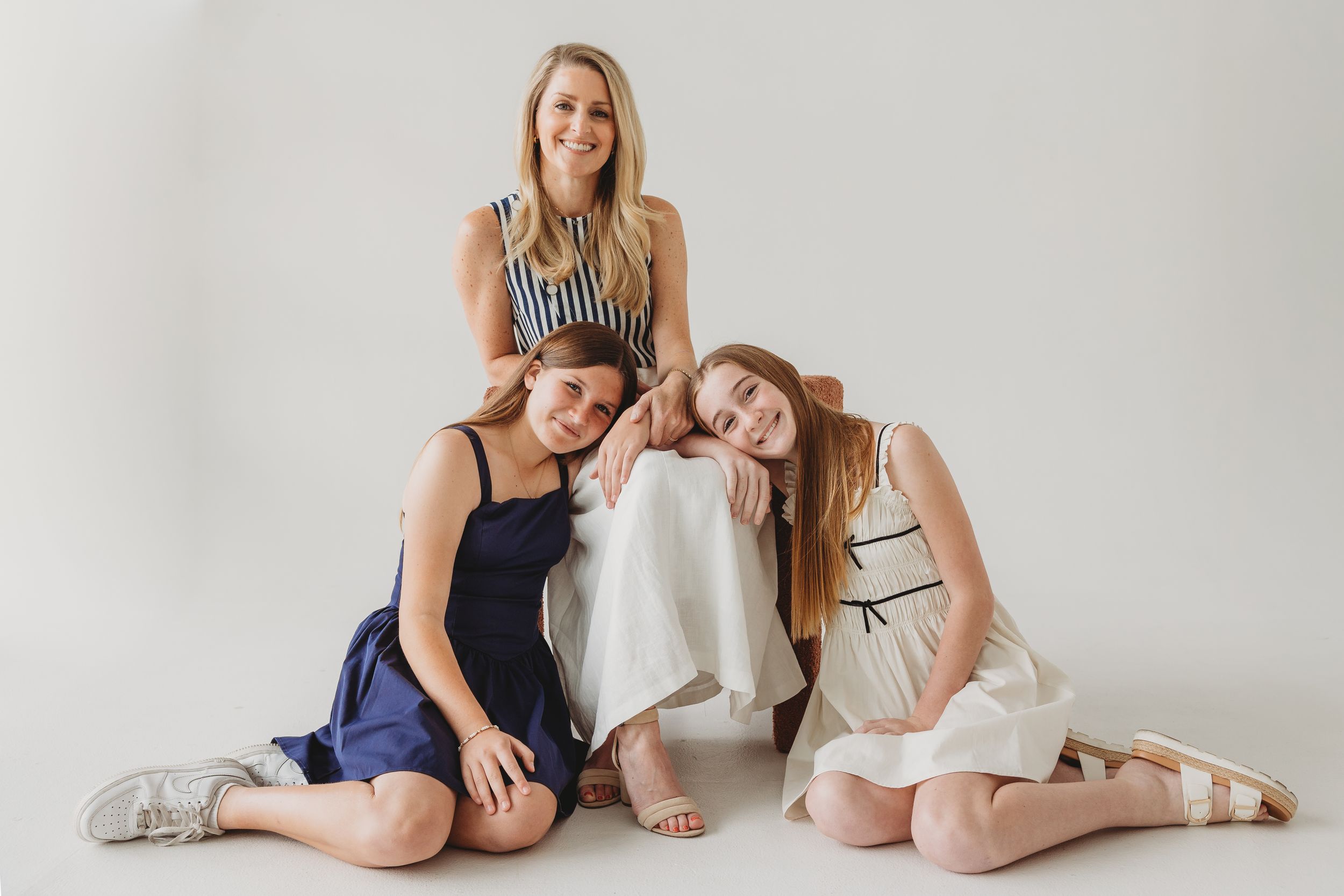 Denver motherhood photography, mom with two daughters at Denver photo studio