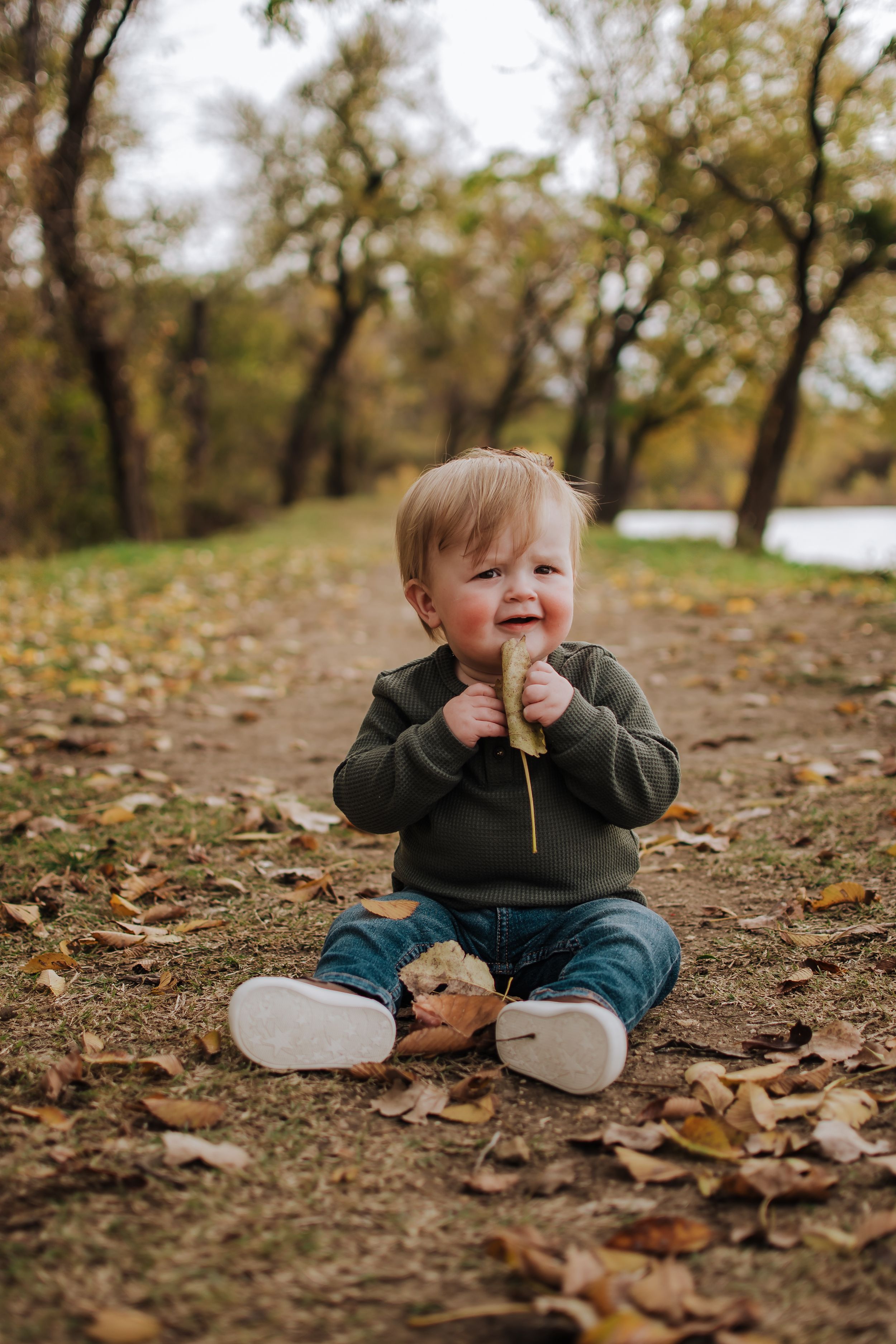 Candid family moment in winter light at Fort Worth park photography session