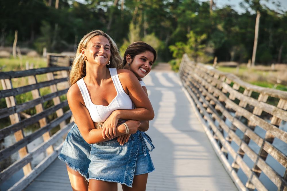 two best friends modeling and having fun together