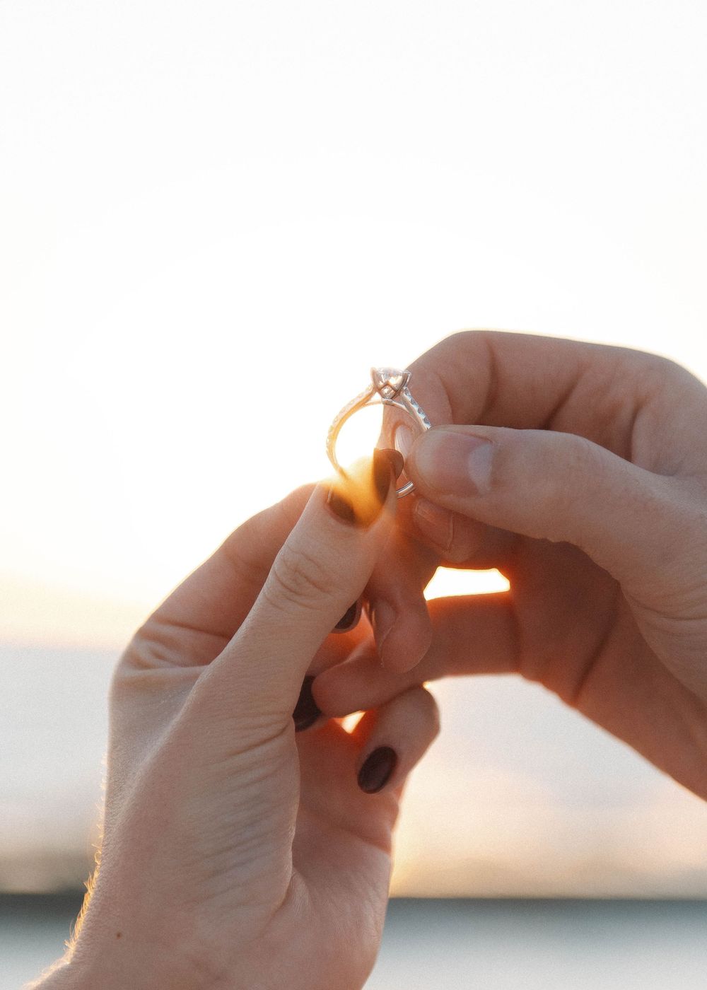 Engagement ring detail from a Honeymoon Island, Florida surprise proposal on the beach.
