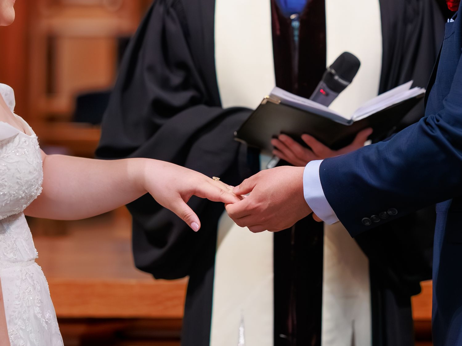 Close-up of exchanging the rings during a Toronto wedding session