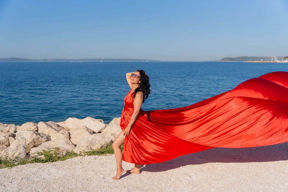 Znjan Beach Split Red Flying dress Croatia SPLIT PHOTO AGENCY