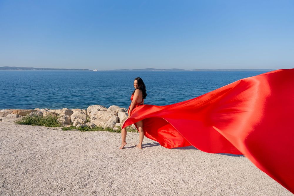 Znjan Beach Split Red Flying dress Croatia SPLIT PHOTO AGENCY
