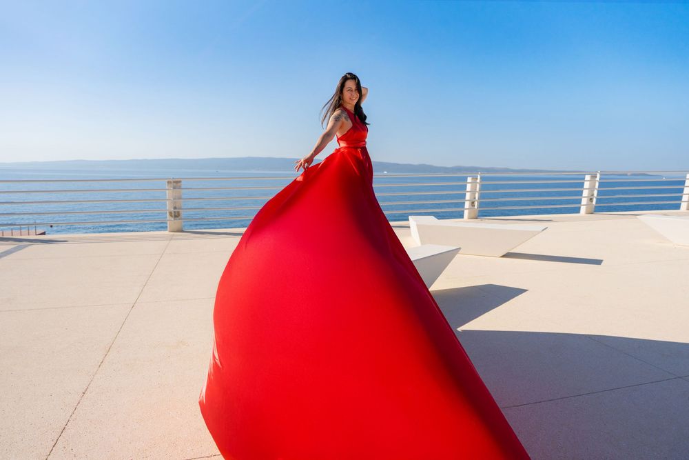 Znjan Beach Split Red Flying dress Croatia SPLIT PHOTO AGENCY
