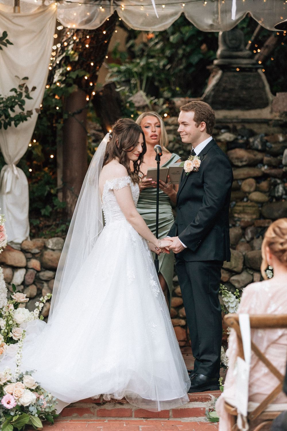 An Asheville wedding photographer shares film photographs of a couple getting married at JuneBug Asheville.