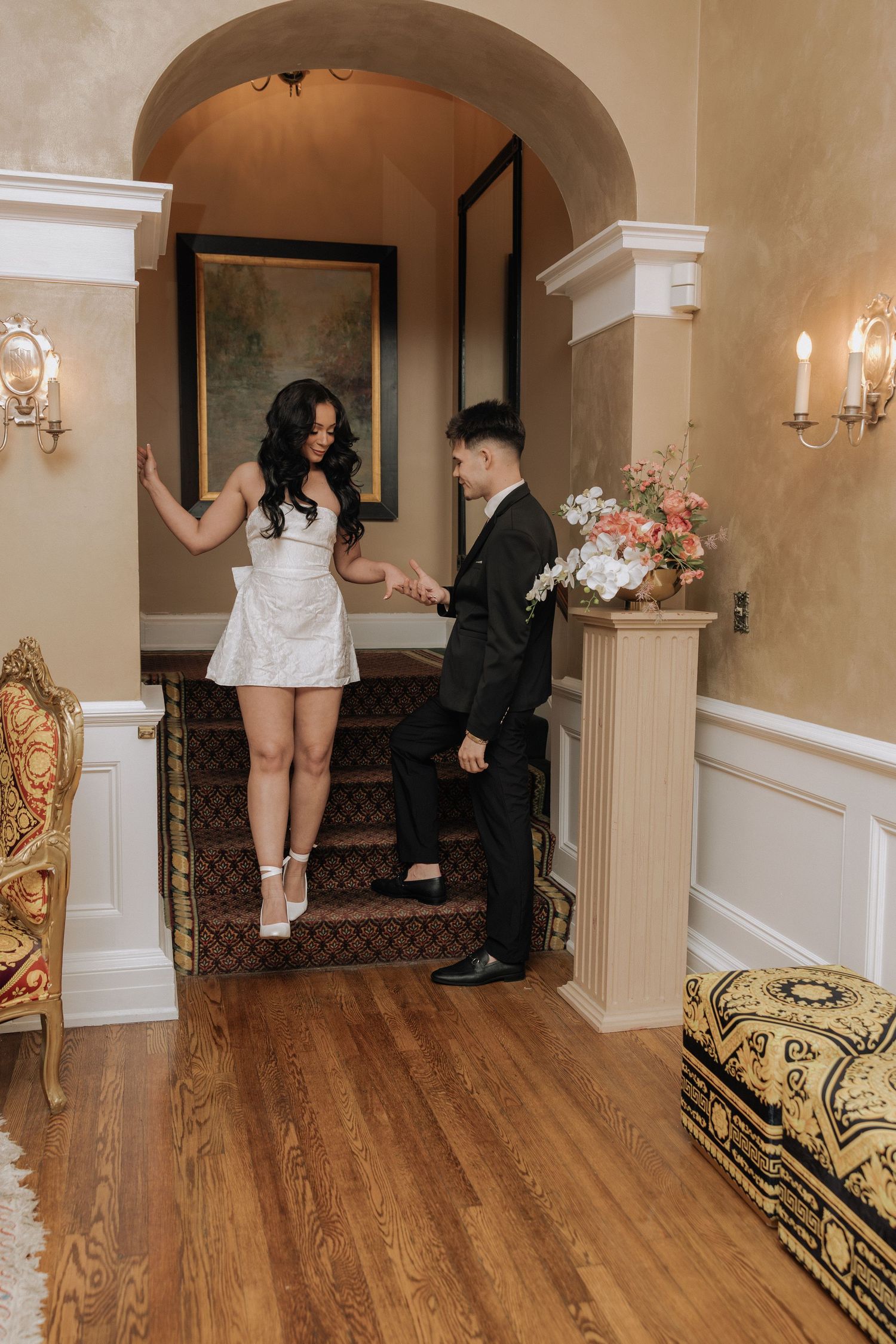Couples photographer Rochester NY capturing natural moments inside The Inn on Broadway