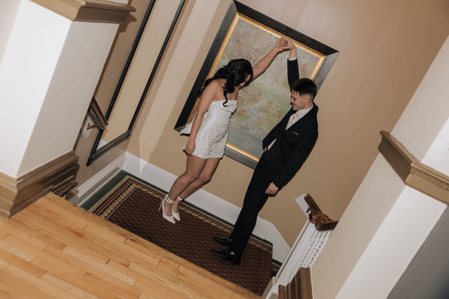 Engagement photographer Rochester NY documenting candid couple at The Inn on Broadway