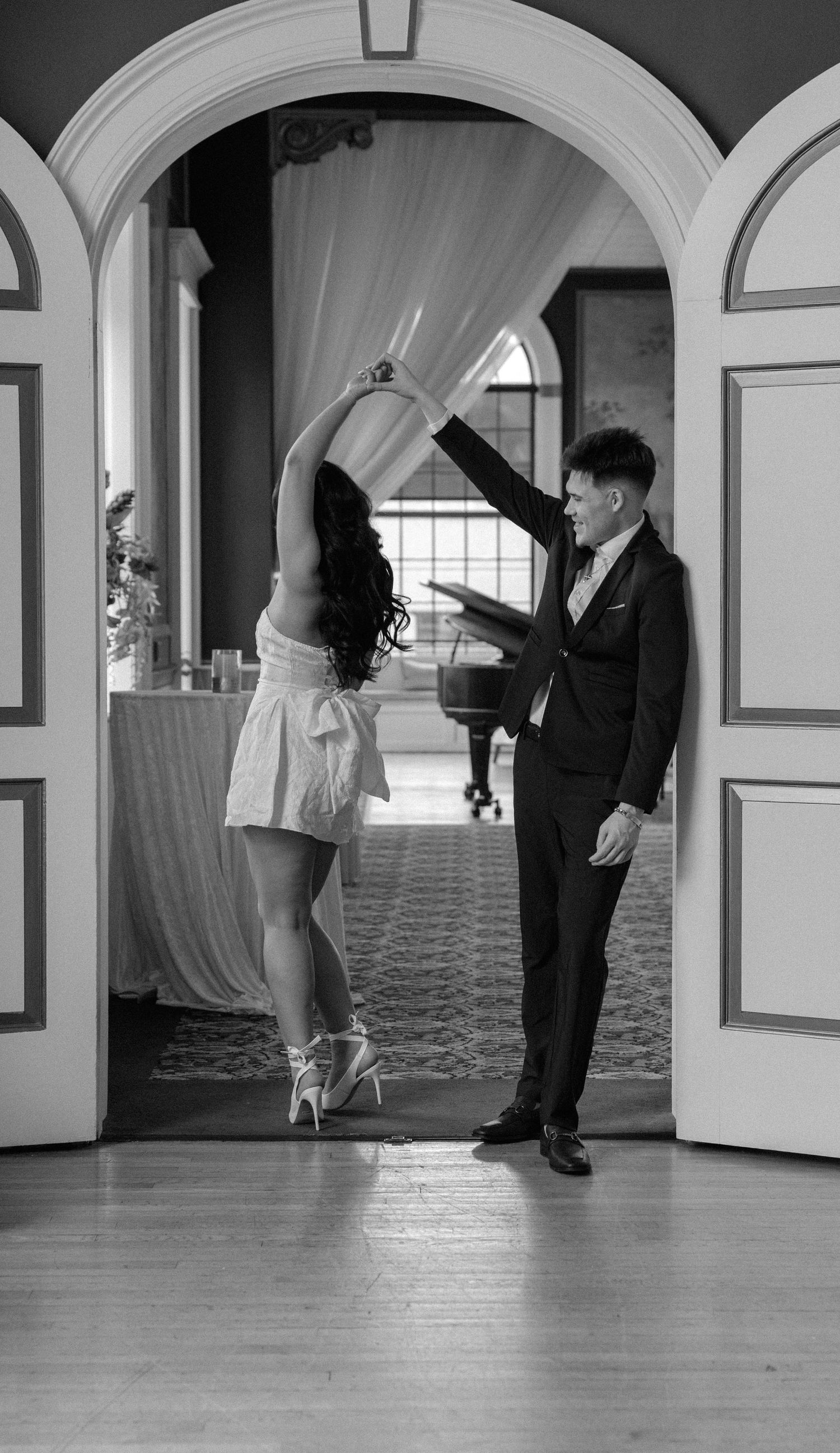 Elegant indoor engagement session photographed by Rochester wedding photographer at The Inn on Broadway