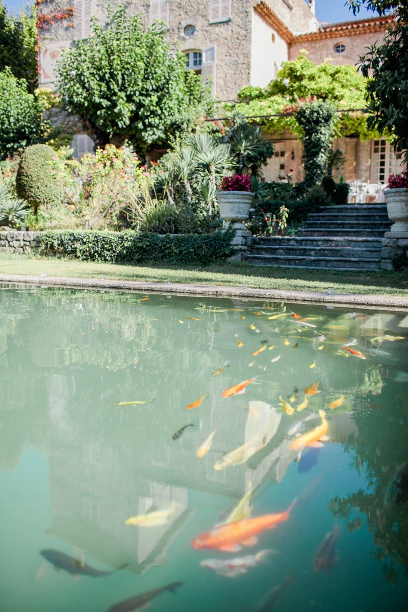 Garden and pond at a historic château wedding venue in the South of France