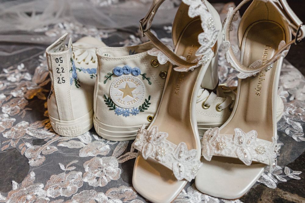 Vintage lace and pearls arranged with delicate details and soft lighting.
